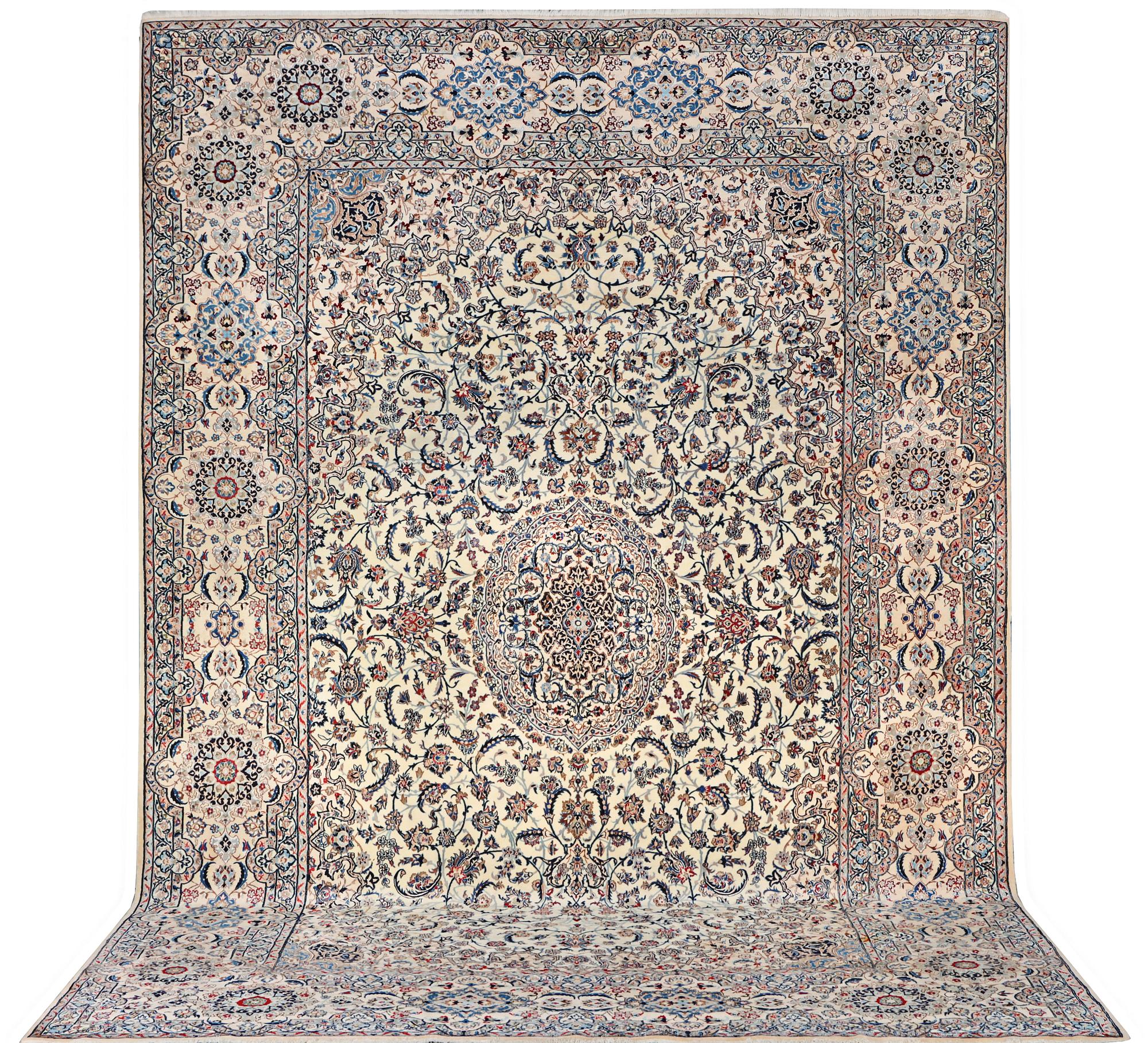 A Nain carpet, part silk, 9 laa, c. 453 x 298 cm.