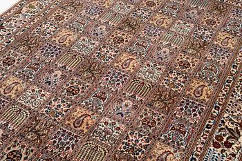 A Moud carpet, part silk, approx. 285 x 195 cm.
