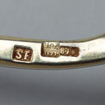 A Russian 19th century parcel-gilt caviar-spoon, marks of Samuel Z. Filander, S:t Petersburg 1877.