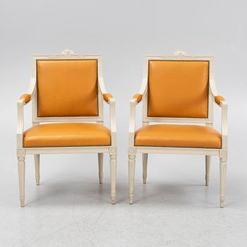 A pair of Gustavian style armchairs, end of the 20th Century.