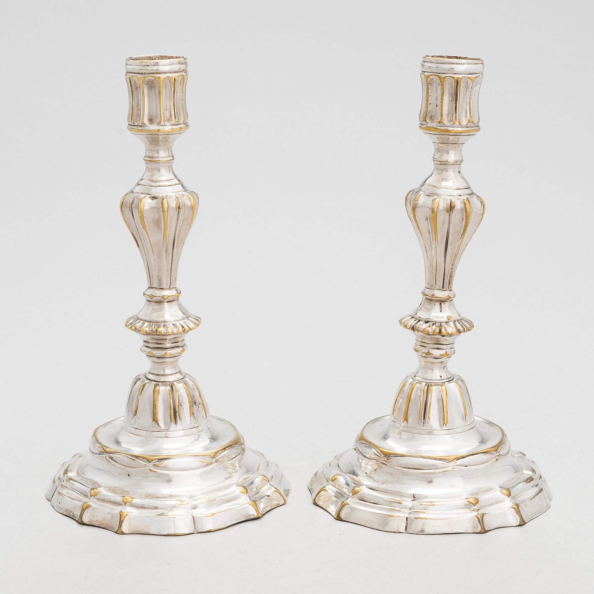 A pair of mid 18th century brass, argent haché, candlesticks, France.