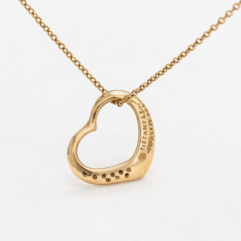Tiffany & Co, Elsa Peretti, an 18K gold 'Open Heart' necklace with small diamonds.
