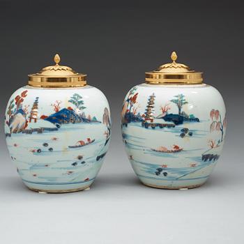 A pair of imari jars with gilt bronze covers. Qing dynasty, early 18th Century.