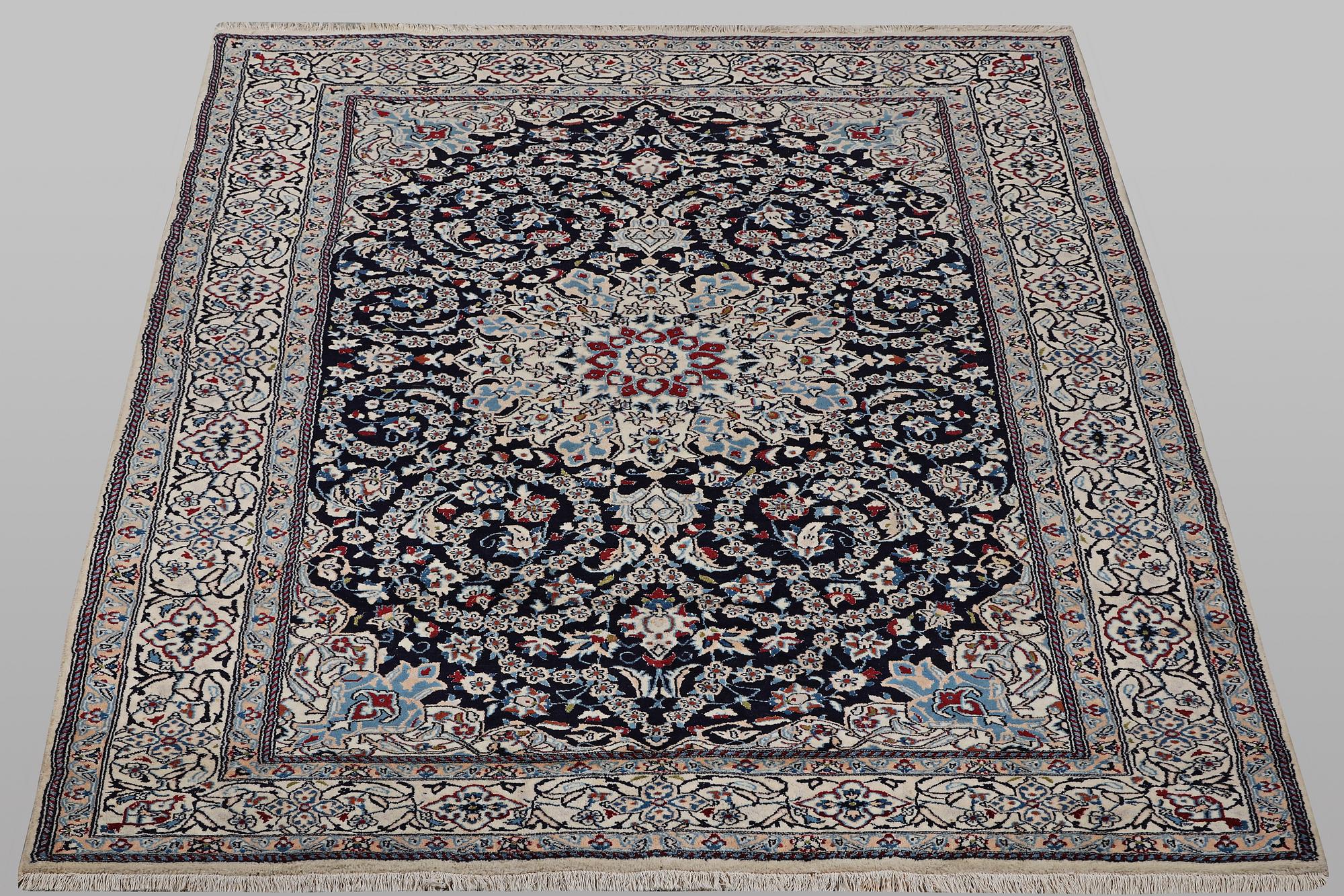 A carpet, Nain, part silk, 9 Laa, ca 295 x 197 cm.