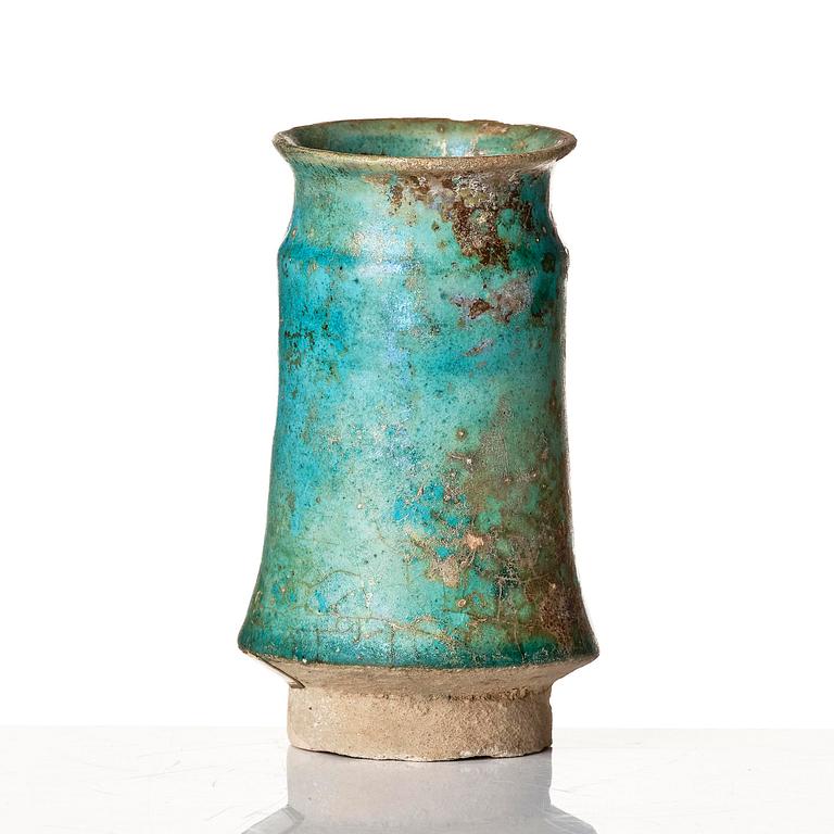 A Kashan Turquoise glazed pottery vase, central Persia (Iran), 11th to 12th century.