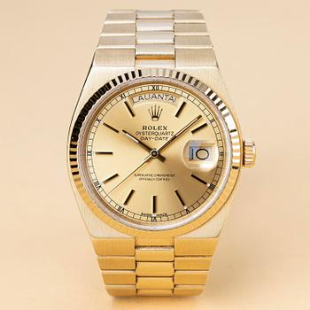 1037. Rolex, Oysterquartz, Day-Date, "Finish Day", ca 1986.