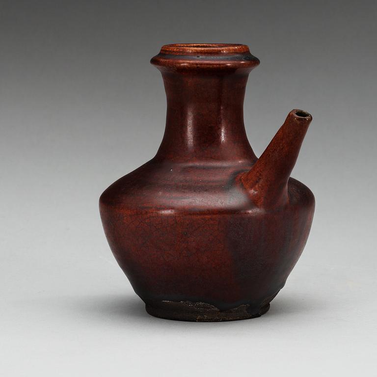 A chesnut brown glazed kendi, Yuan dynasty (1280-1368).