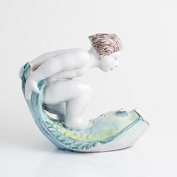 Tyra Lundgren, a faience figurine, Rörstrand, dated -30.
