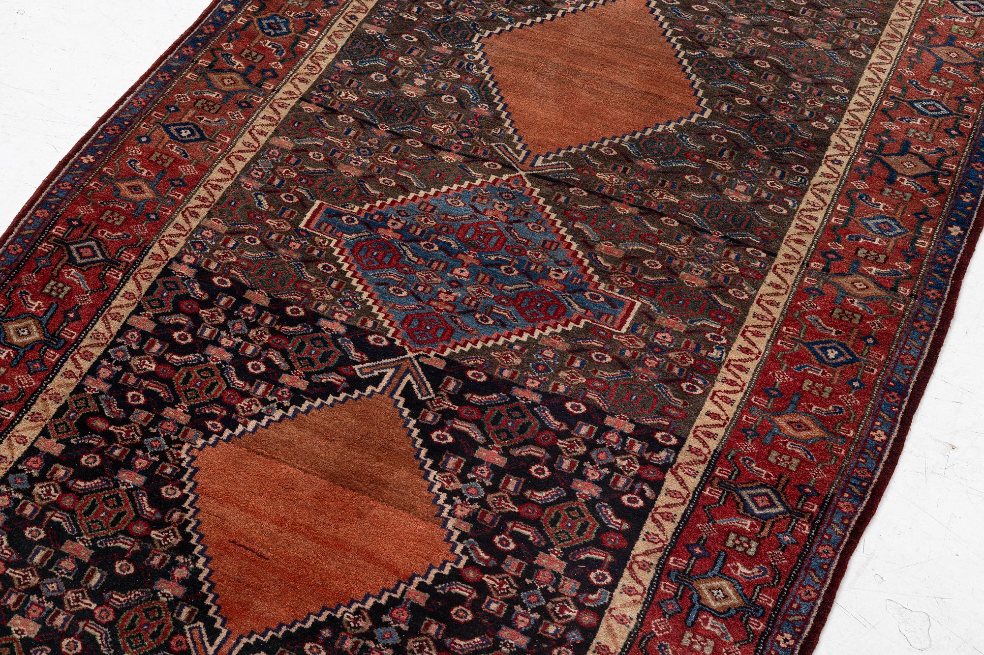 A semi-antique Bidjar rug, c. 255 x 135 cm.
