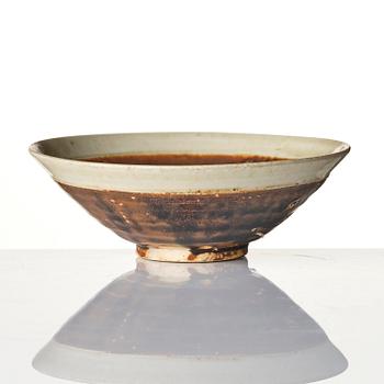 A brown and white glazed bowl, Song dynasty (960-1279).