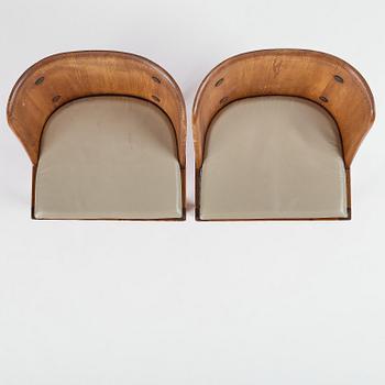 Axel Einar Hjorth, a pair of stained pine "Lovö" armchairs, Nordiska Kompaniet, Sweden, 1930s.