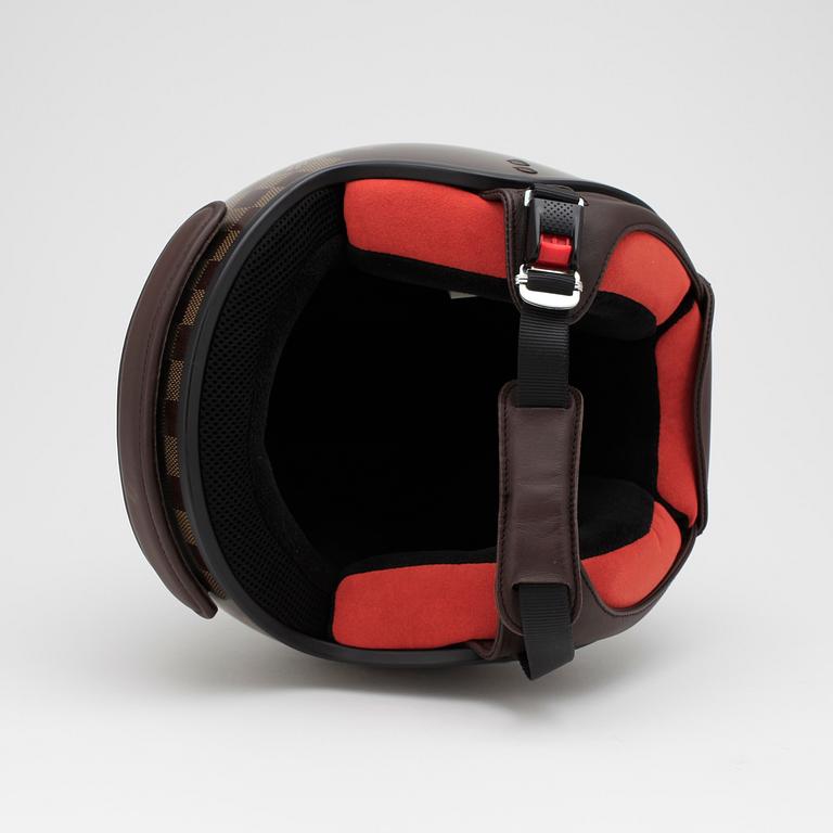 LOUIS VUITTON, a motorcycle helmet.