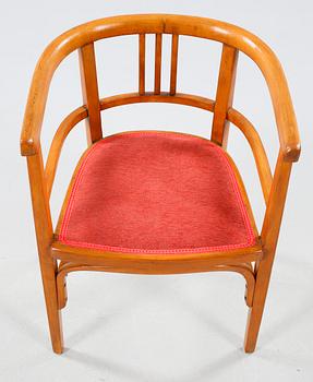 A table and a arm chair from the second quarter of the 20th century.