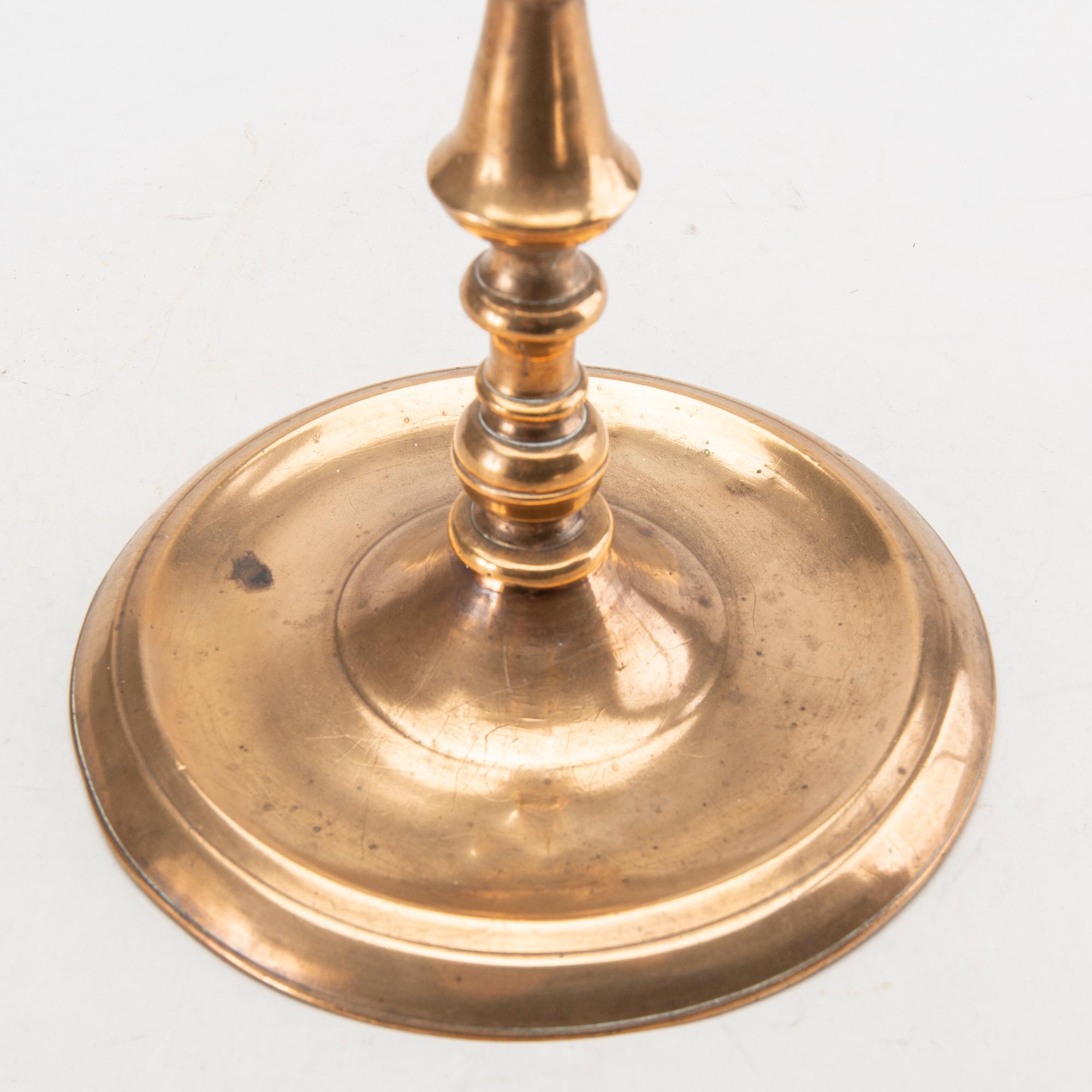 LJUSSTAKE omkring 1600 mässing.