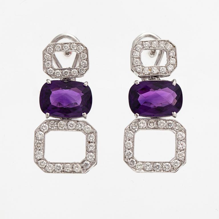 A pair of 18K white gold earrings with amethysts and diamonds ca. 1.24 ct in total. Italy.