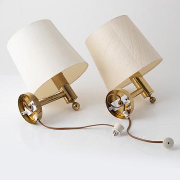 A pair of model "V-18" brass wall lamps, Bergboms, second half of the 20th century, sweden.