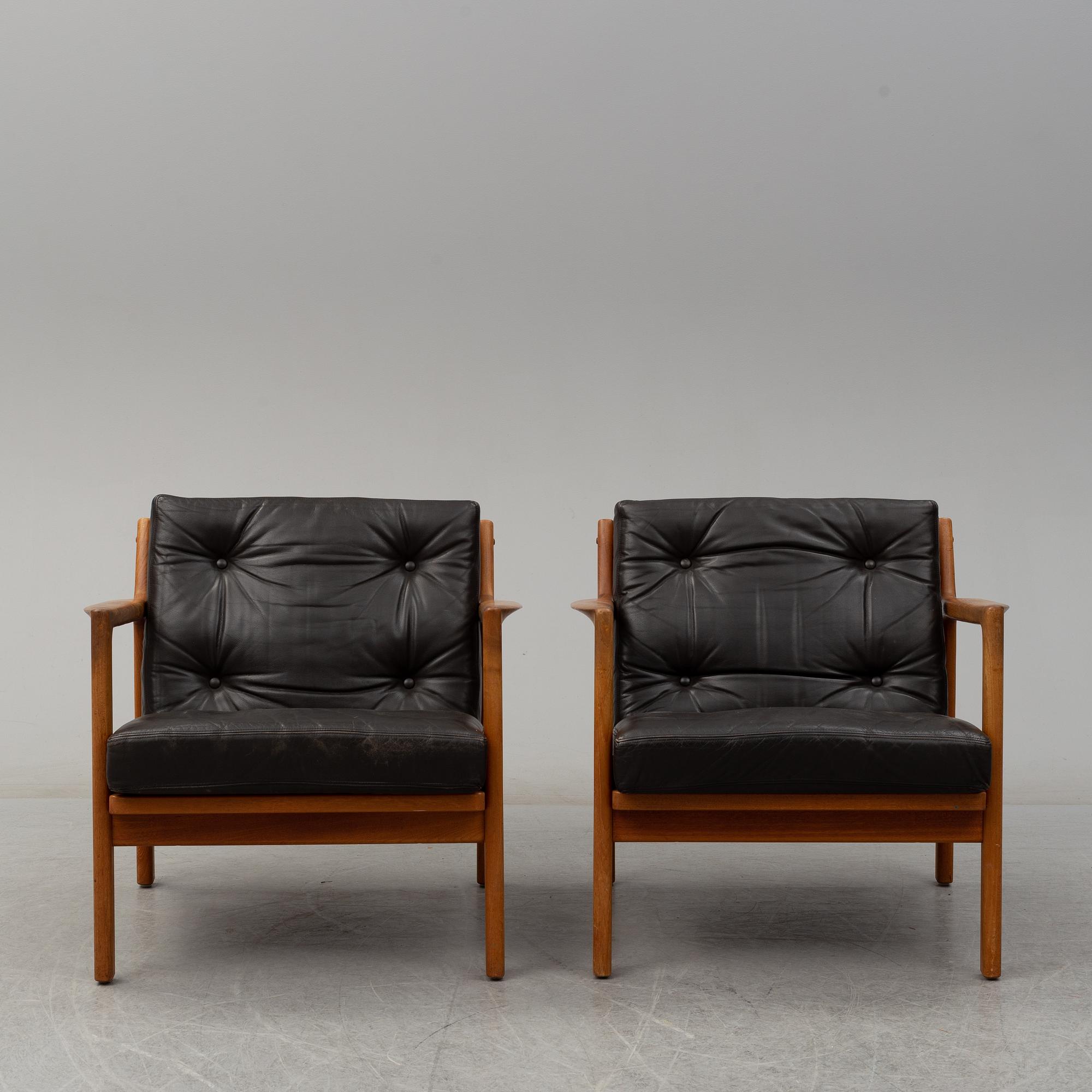 KARL ERIK EKSELIUS, a pair of 1960's teak armchairs.