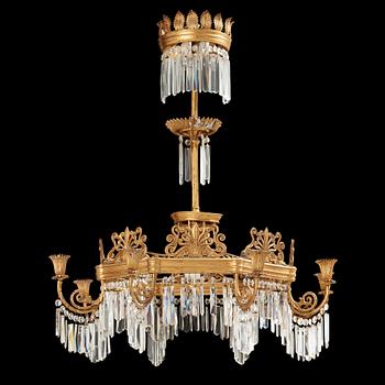 1243. A German 19th century eight-light chandelier in the manner of Karl Friedrich Schinkel.