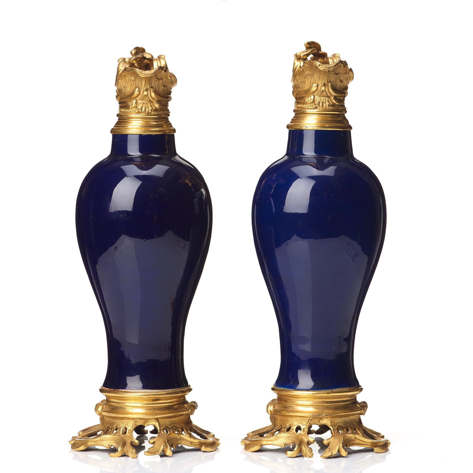 A pair of gilt bronze mounted vases, Qing dynasty, Qianlong (1736-95). French bronze mounts.