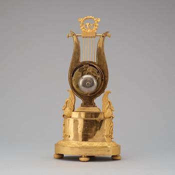 A French Empire early 18th century mantel clock.