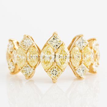 Ring, with yellow oval and princess-cut diamonds.