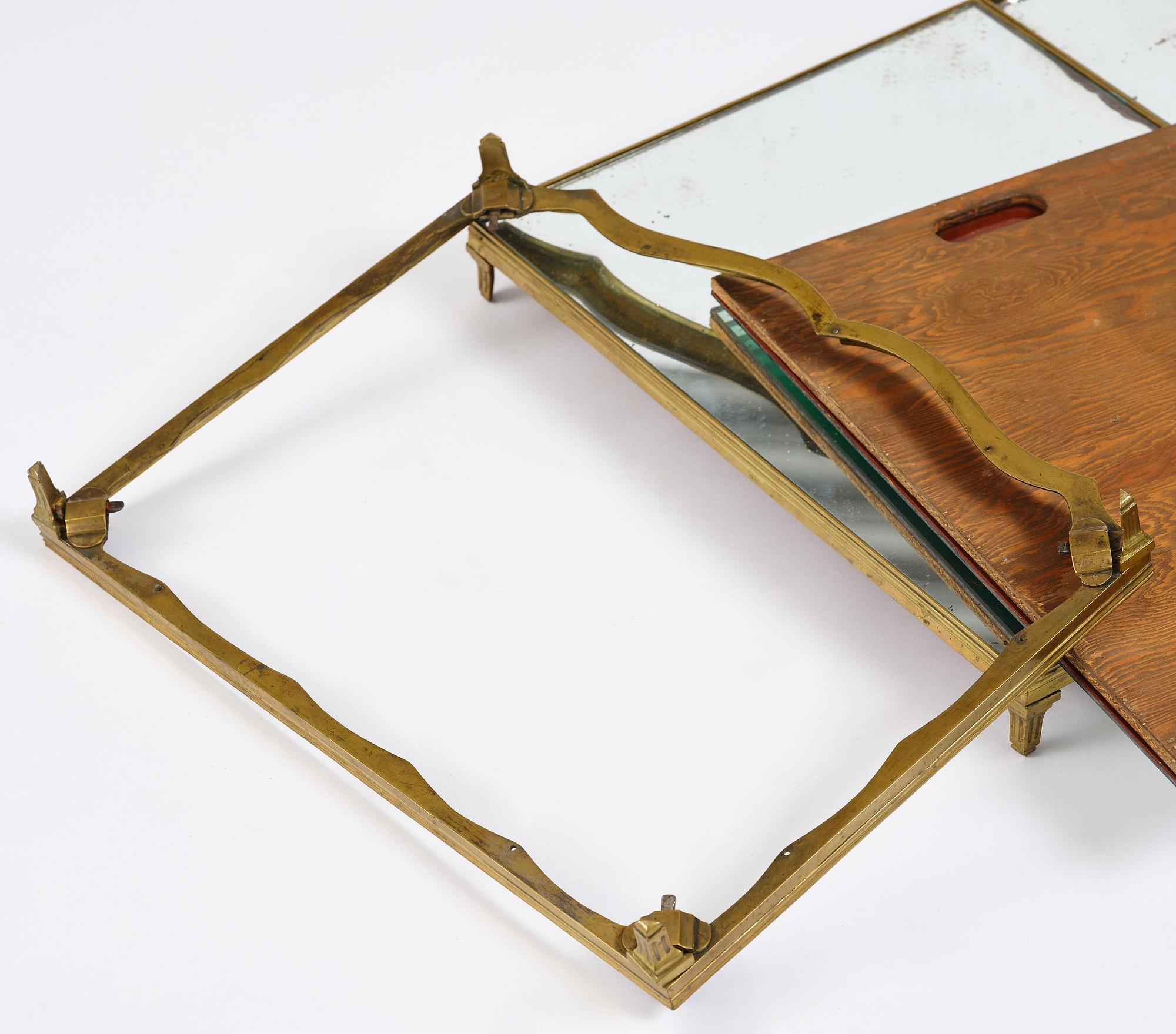 A Gustavian three-piece brass and glass surtout de table, Stockholm, later part 18th century.