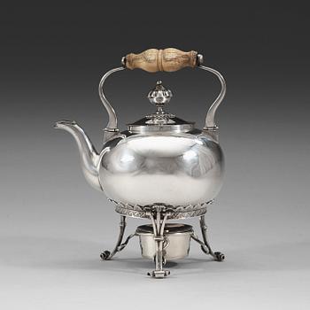 1026. A Swedish 19th century silver tea-pot and stand, marks of Barkander & Söhrling, Linköping 1830.
