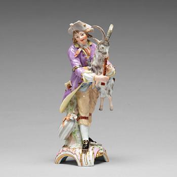 A Berlin porcelain figure of a man with a bagpipe in the shape of a goat, 18th Century.