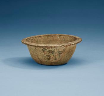 A green glazed bowl, Han dynasty (206 BC – 220 AD).