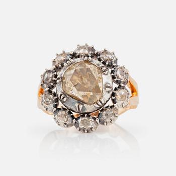 1251. A brown and white rose-cut diamond ring.