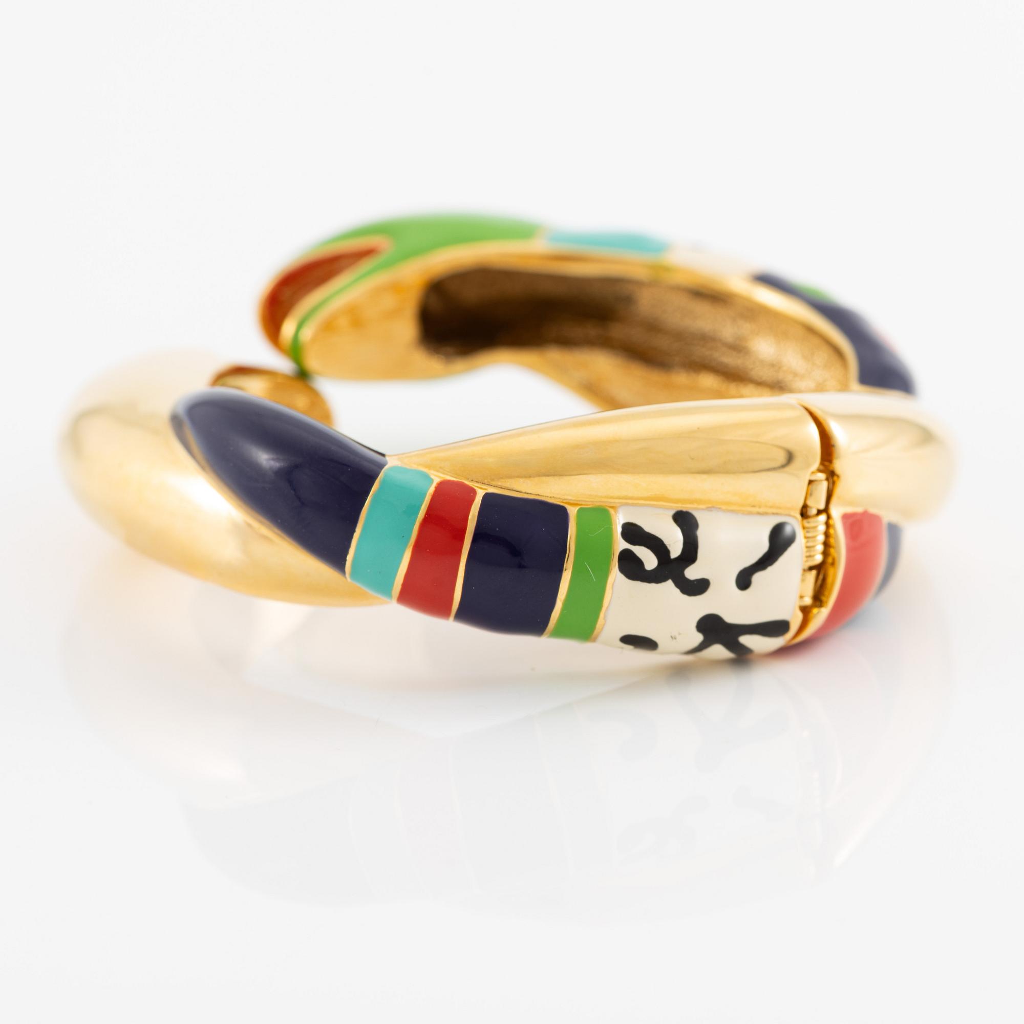 Niki de Saint Phalle ormarmband gul metall med emalj.