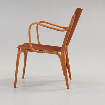 A Carl-Axel Acking beech and mahogany armchair, Svenska Möbelfabrikerna, Bodafors 1940's.