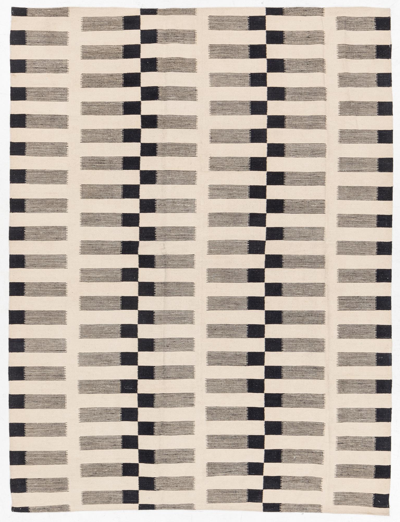 A flat-woven rug, c. 232 x 175 cm.