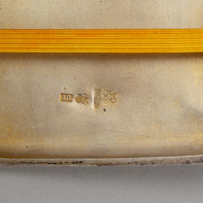 A Russian parcel-gilt silver and niello cigarette-case, import marks 1882-98.