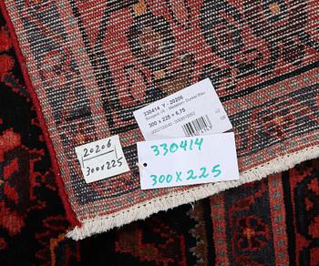 A Borujerd carpet, c. 300 x 225 cm.