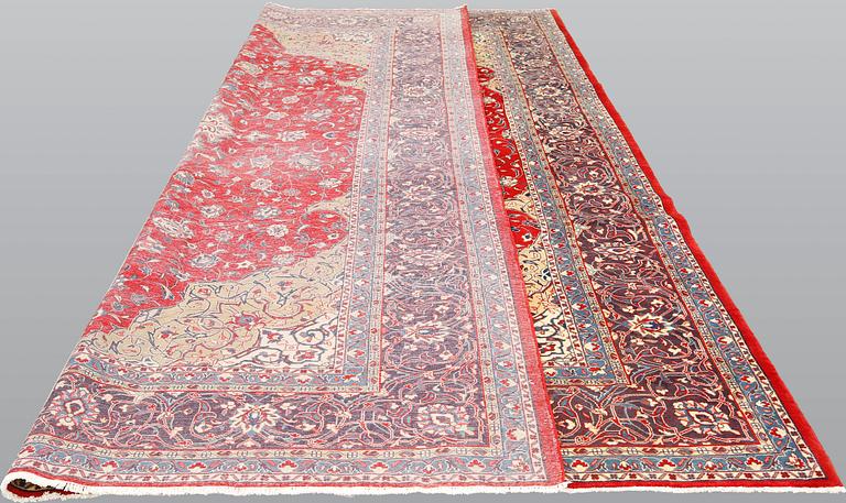 A Sarouk carpet, approximately 365 x 277 cm.
