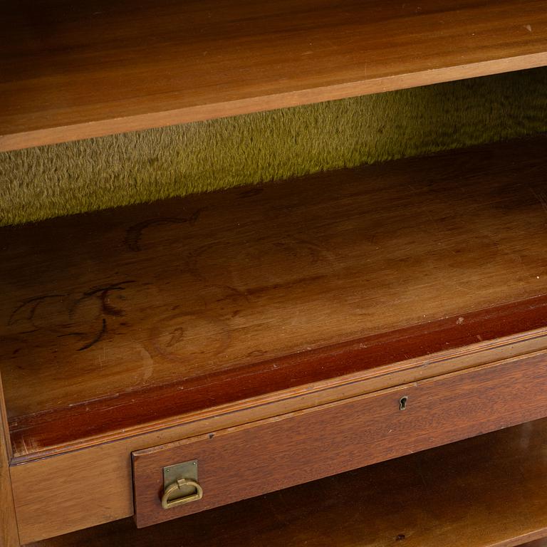 A display cabinet, early 20th Century.