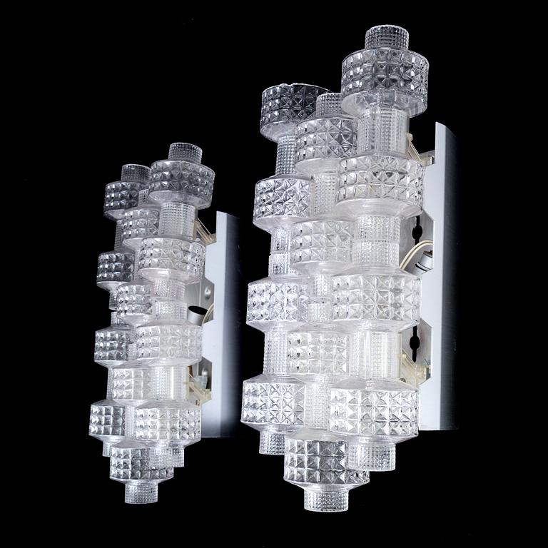 A pair of wall lamps by Gert Nyström for Fagerhult, second half of the 20th century.