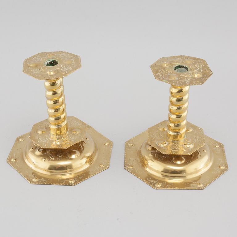 A pair of brass baroque style candlesticks, 20th century.