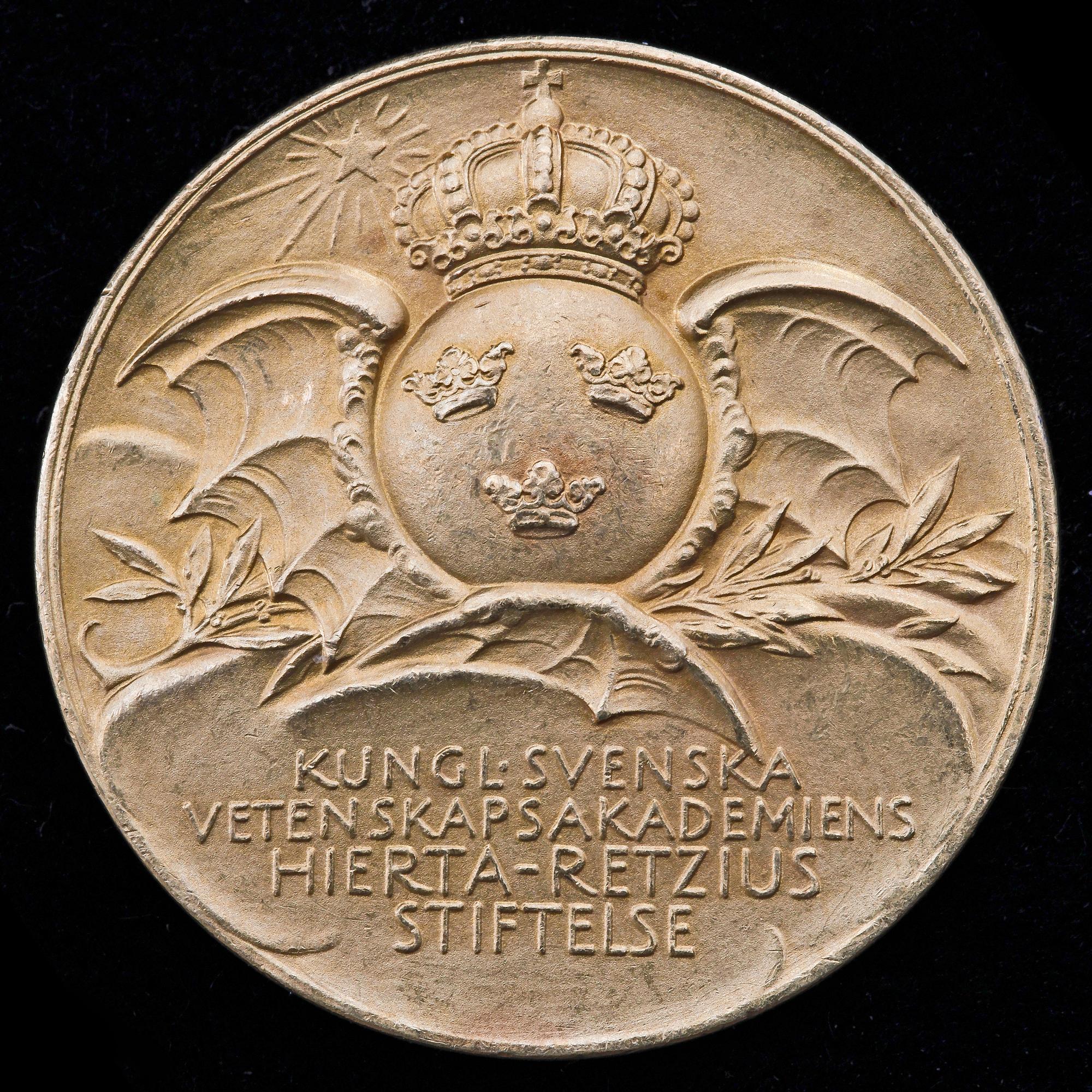 MEDALJ, guld. Vikt: 25 gram.