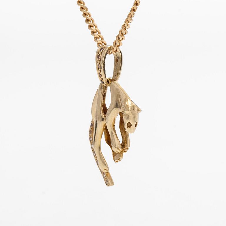 A 14K gold necklace with a panther pendant set with white stones.