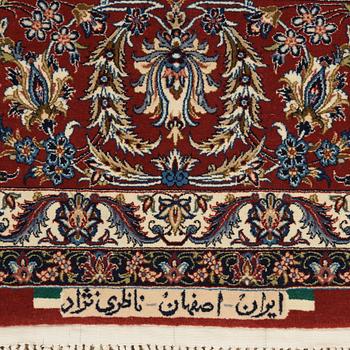 A CARPET. An old Esfahan Nazeri nedjad. 240,5 x 157,5 cm (as well as one end with one cm flat weave,