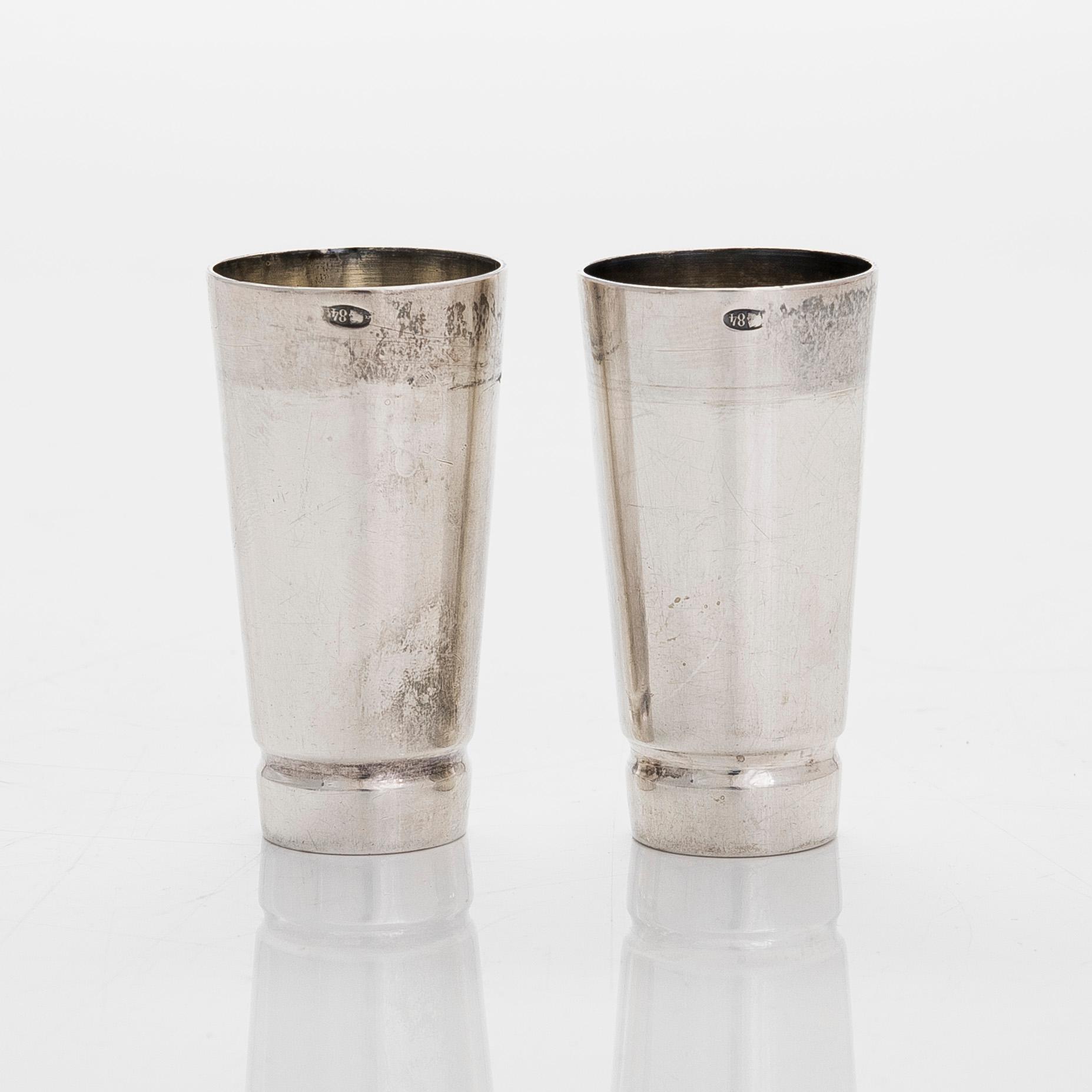 Five silver beakers, maker's mark of  P.J. Silventoinen, and a box, cup and letter opener, Russia, France and Finland.