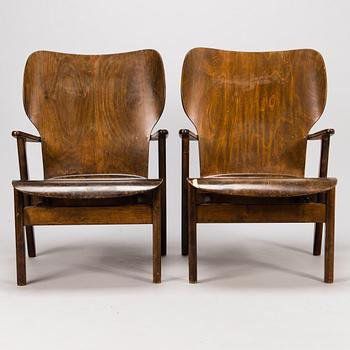 Ilmari Tapiovaara, A pair of 1950s 'Domus' armchairs for Keravan Puuteollisuus. Finland.