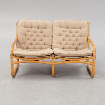 A bamboo and rattan three-piece 'Baden' furniture suite, IKEA, 1970's.