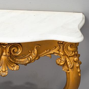 A late 19th new rococo century console table.