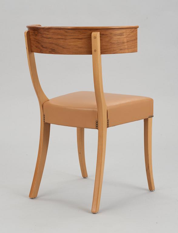A Josef Frank walnut, beech and brown leather chair, Svenskt Tenn, model 300.