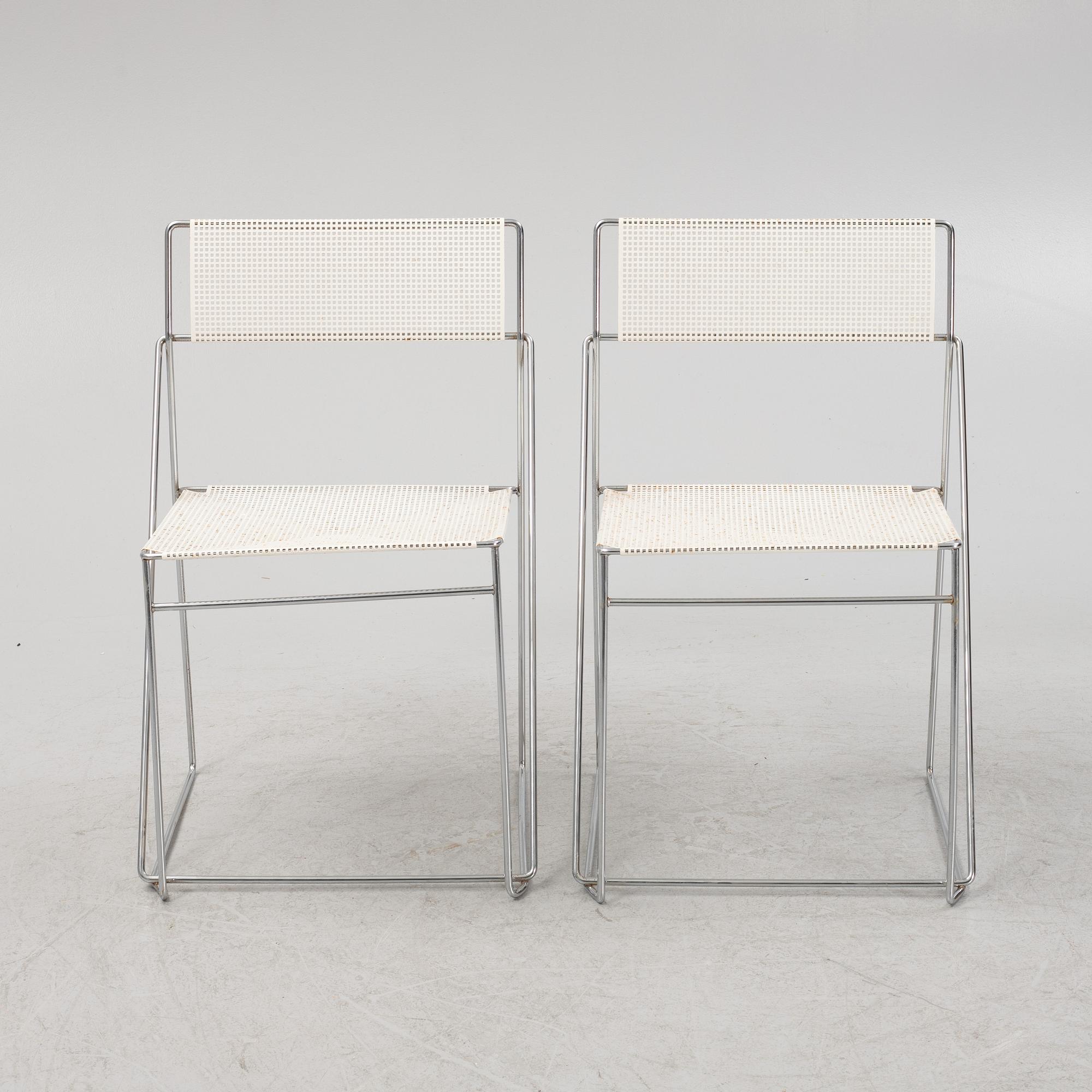 Nils Jörgen Haugesen, a pair of 'X-Line' chairs, Hybodan, Denmark, the model designed in 1977.