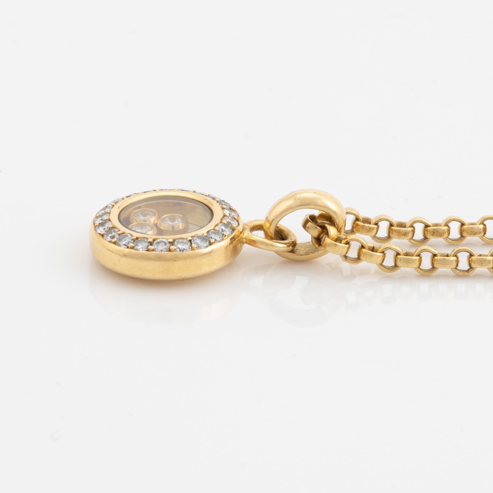 A Chopard "Happy diamonds" 18K gold necklace set with round brilliant-cut diamonds.