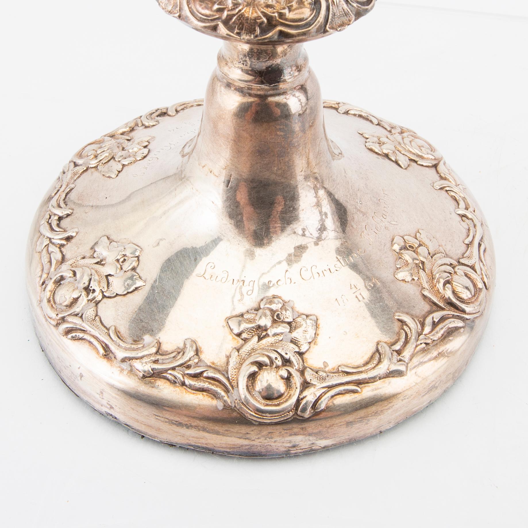 A pair of Ne Rococo epns candelabras mid 1800s.